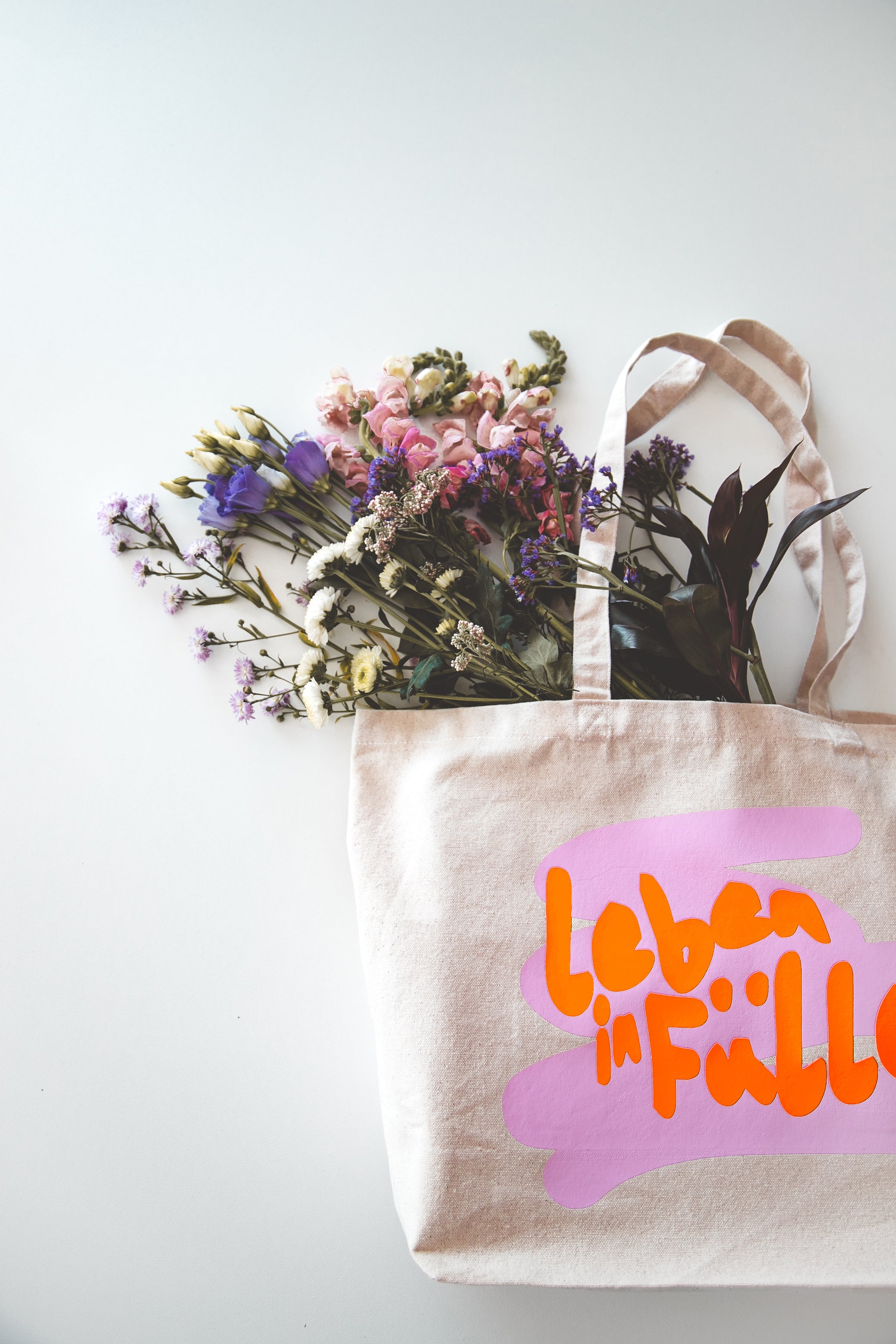 Canvas Tragetasche mit Neonprint "Leben in Fülle"